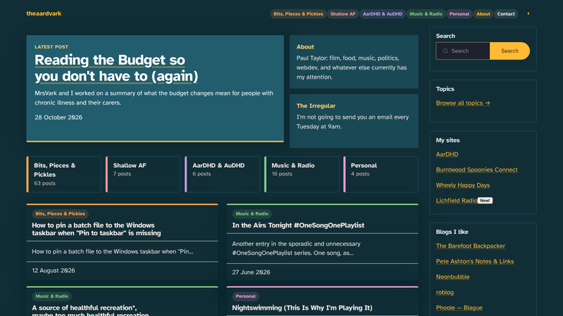 The theaardvark.co.uk homepage in dark mode: a teal panel showing the latest post, five coloured category cards with post counts, a grid of recent posts, and a sidebar of search, topics and links to my other sites. All built by hand, so every bit of it is my fault.