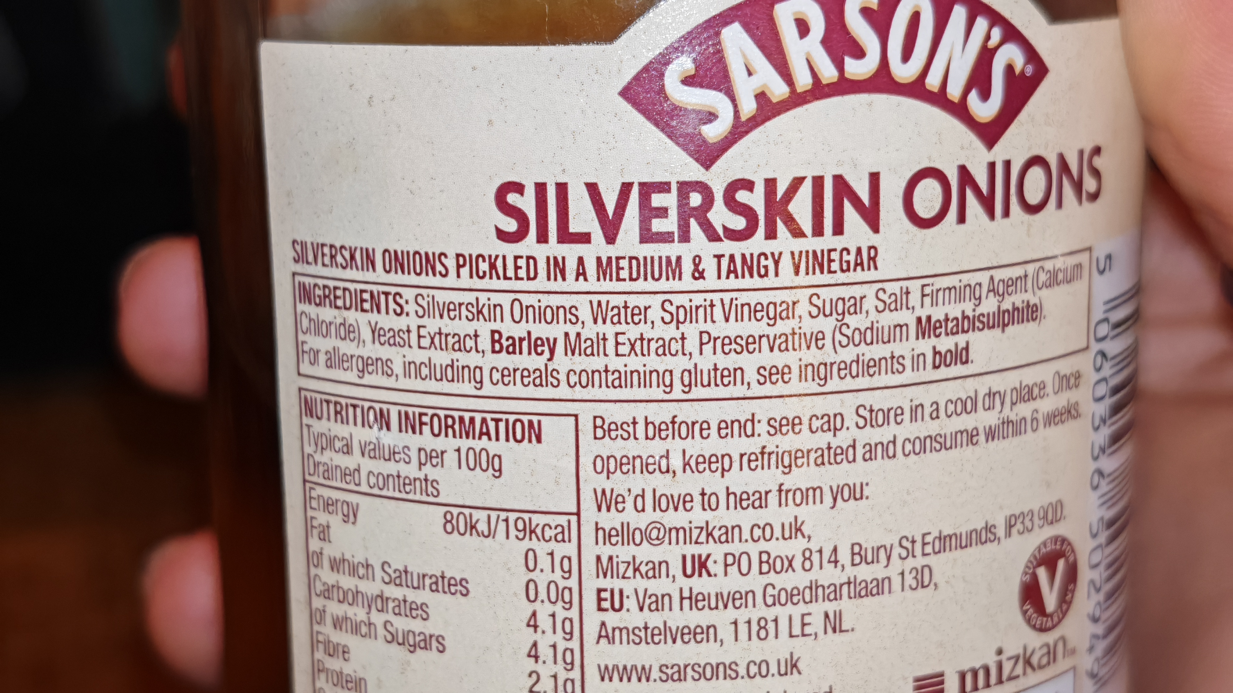 The jar's back label reveals a fairly standard ingredients list: silverskin onions, water, spirit vinegar, sugar, salt, and the usual preservatives.