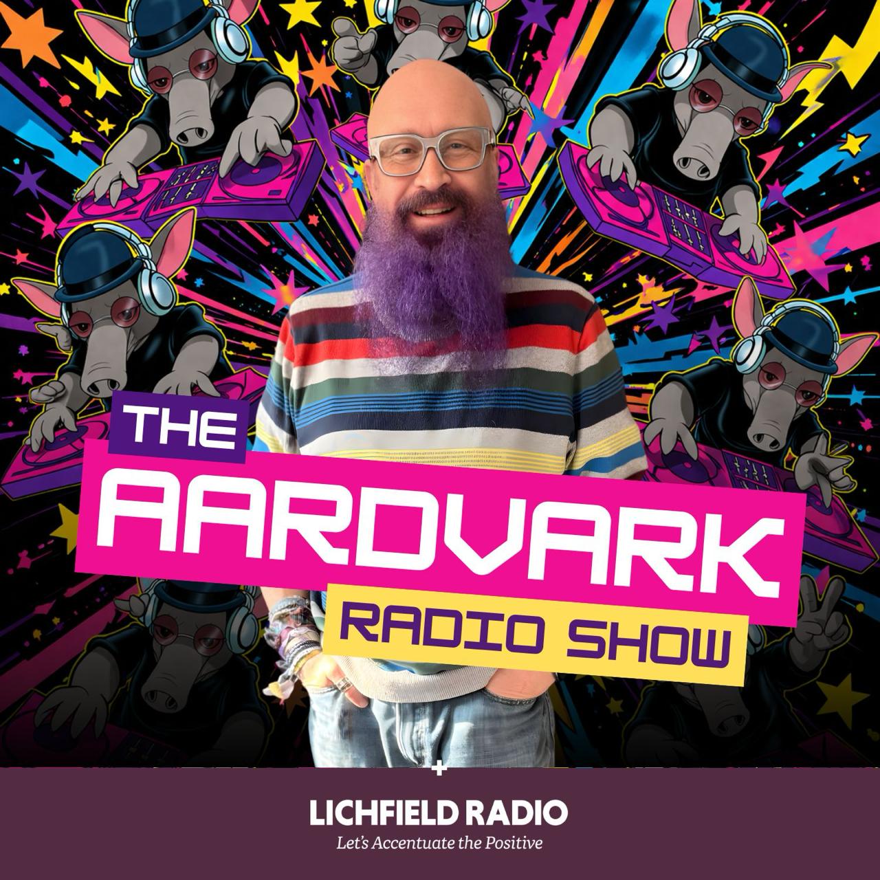 Promotional graphic for The Aardvark Radio Show on Lichfield Radio. theaardvark — a bald man with glasses and a long purple beard — stands centre frame in a multicoloured striped t-shirt and jeans, hands in pockets, smiling. Behind him is a vivid comic-book explosion of colour: neon starbursts in pink, blue, orange and yellow, surrounded by multiple cartoon aardvarks in black jackets and bowler hats, wearing headphones and operating DJ decks. Bold text reads "THE AARDVARK RADIO SHOW" in white and yellow on pink and magenta banners. At the bottom, a dark purple bar carries the Lichfield Radio logo and tagline: "Let's Accentuate the Positive."